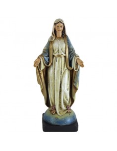 Imagen religiosa de la virgen milagrosa.
En esta figura de nuestra señora, María viste túnica blanca con velo y capa azul con 