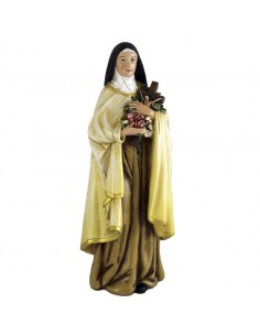Santa Teresa lleva una cruz con rosas en sus manos. Viste unas tugas color claro o crema de monja.
Imagen realizada en pasta m