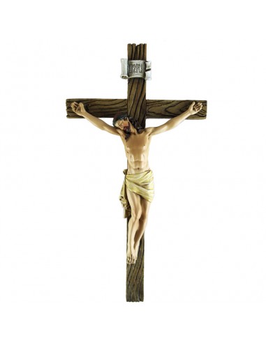 Crucifijo de estilo clásico.
La cruz es de color madera y está adornada por sus betas. en la parte superior, encontramos el ca