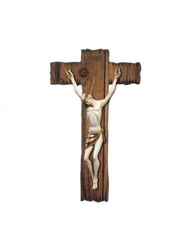 Crucifijo de madera rustica con Cristo color blanco con detalles en plata.
15 x 30 cm