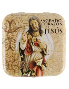 Caja de lata de caramelos de menta.
Imagen de Sagrado Corazón de Jesús en la parte exterior de la cajita.
