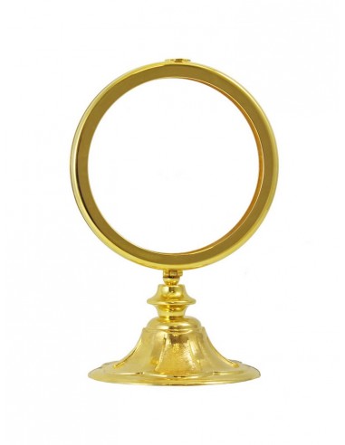 Ostensorio dorado con base labrada de petálos.

Para formas de 16 cm de diámetro.