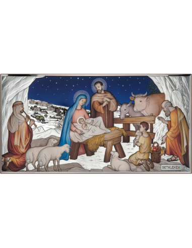Icono religioso en plata laminada y en color.
Muestra el nacimiento de Cristo en el portal de Belén con la familia sagrada aco
