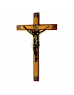 Crucifijo de pared. La cruz es de madera de 42 cm de altura y el cristo es metálico de 22cm.
La cruz tiene un borde color made